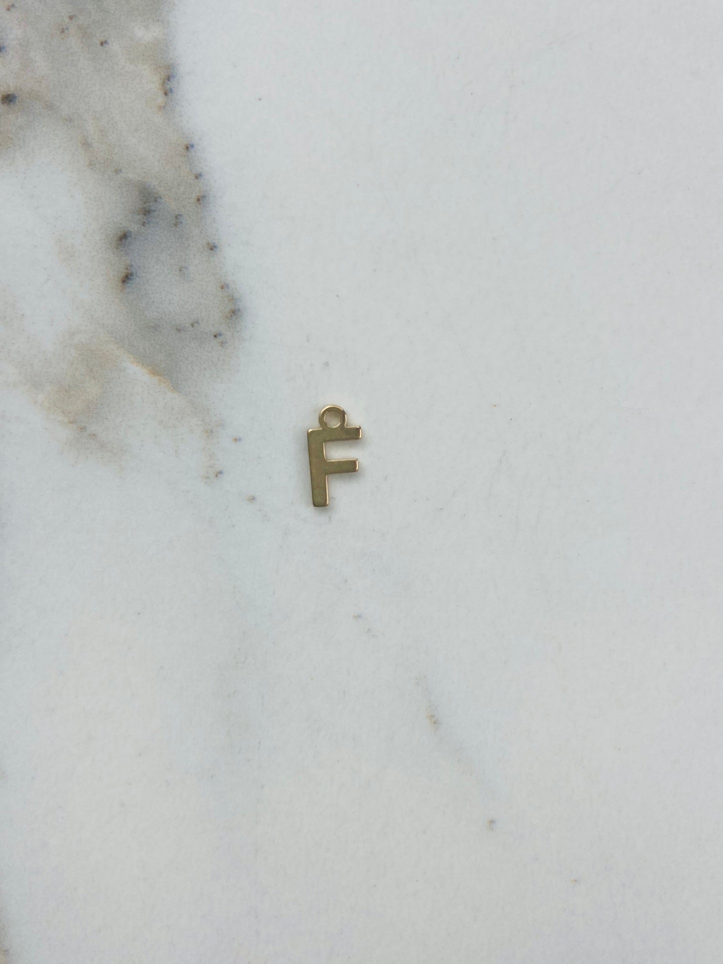 Bedel letter F goud