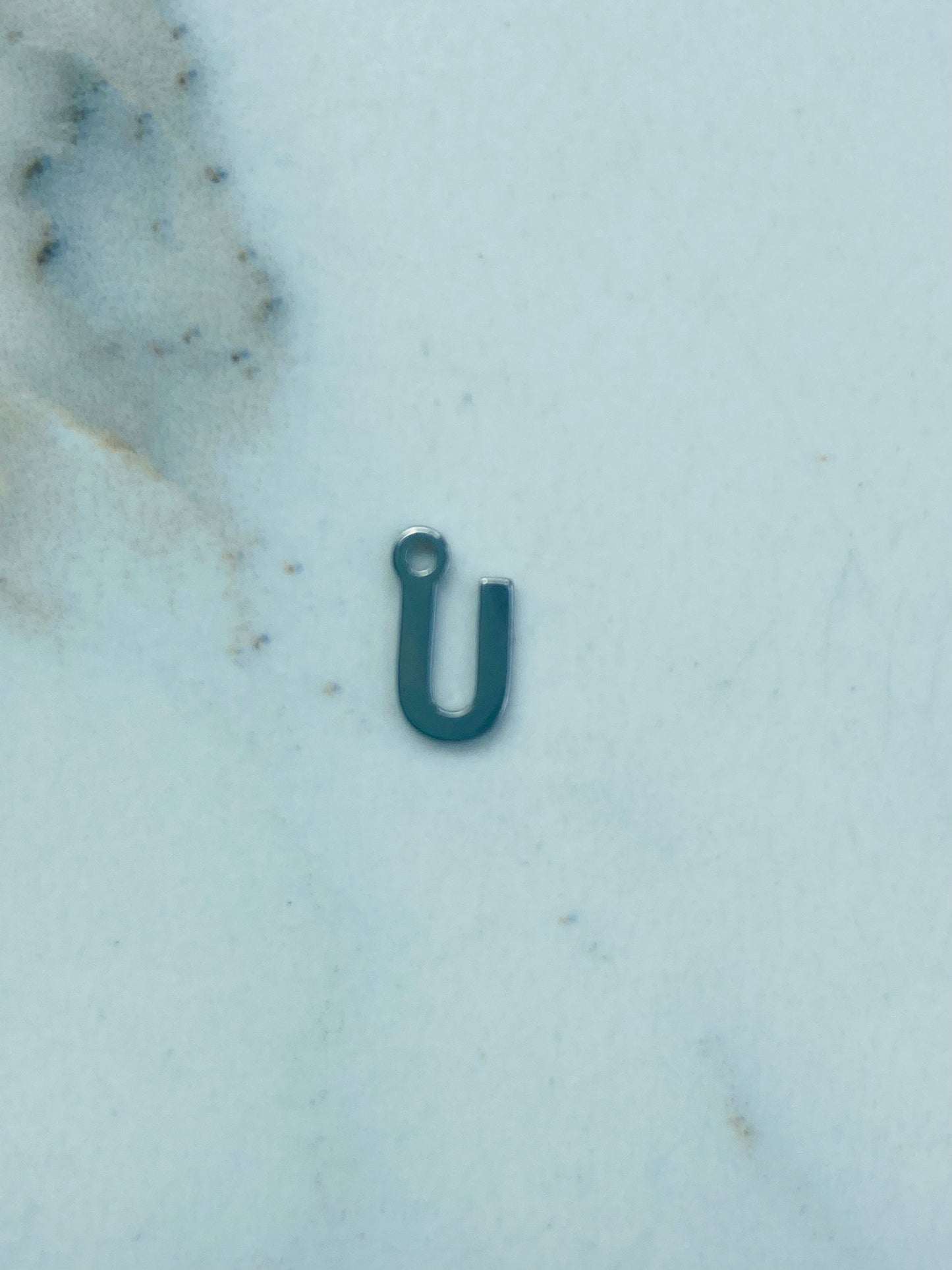 Bedel letter U zilver